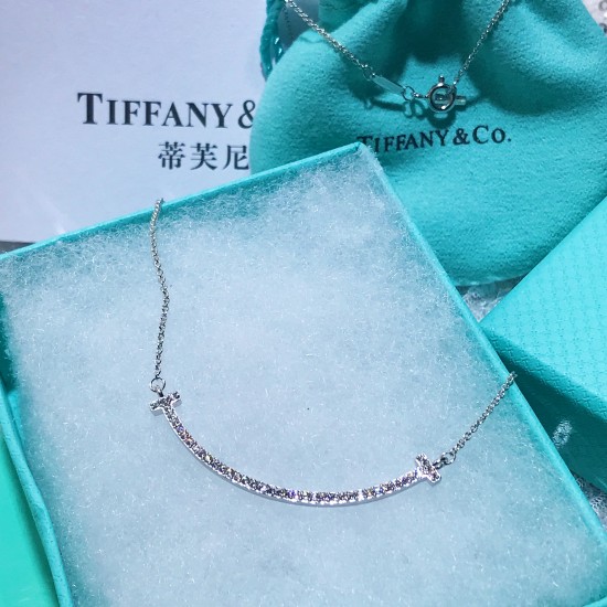 Tiffany T Smile pendant necklace in white gold and diamonds, mini size